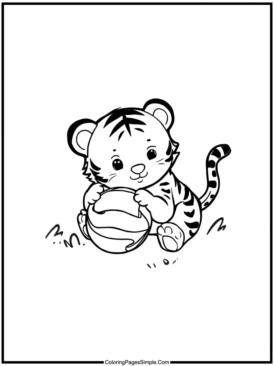 Cute Tiger Cub playing with big ball.