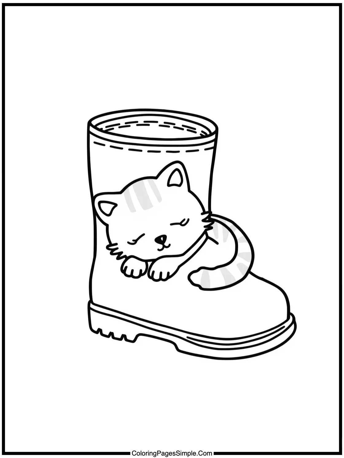 Cute kitten sleeping inside a boot.