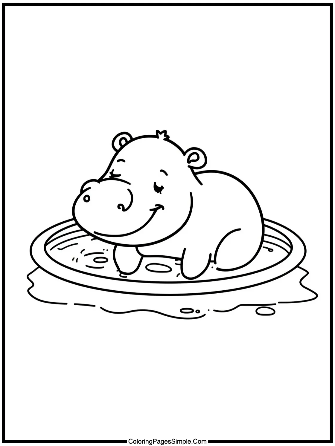 Happy Tapir enjoying a mud bath calmly.