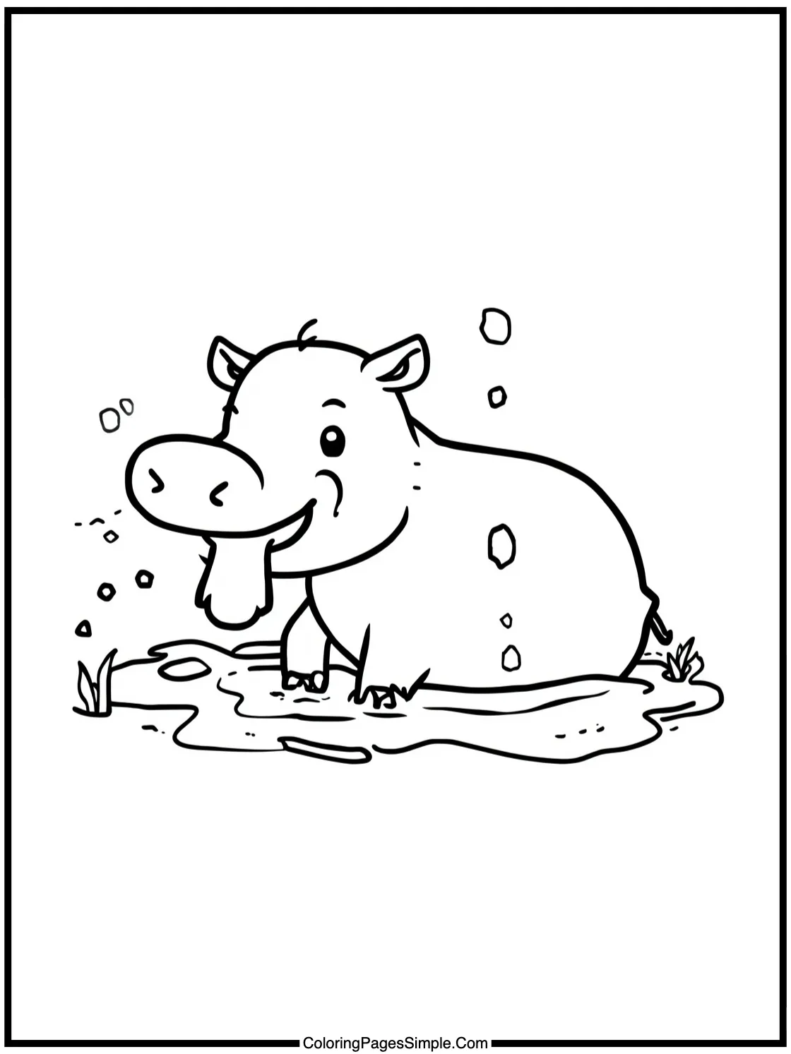 Happy tapir enjoying a mud bath.