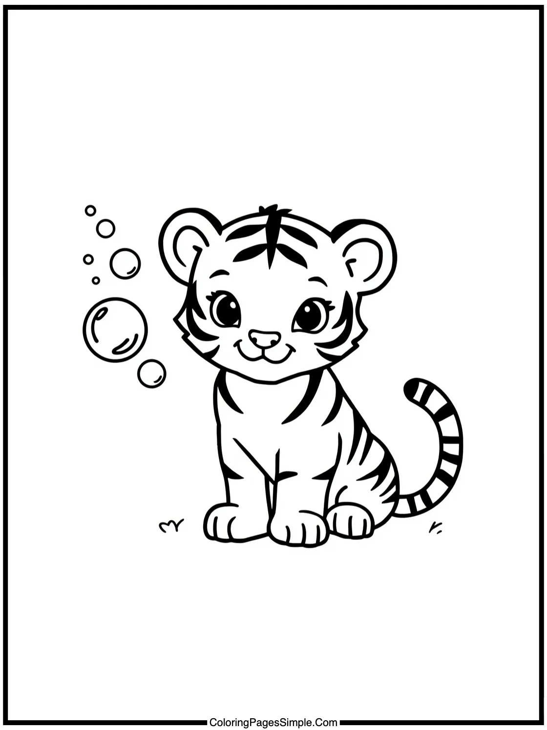 Little tiger cub playing with bubbles.
